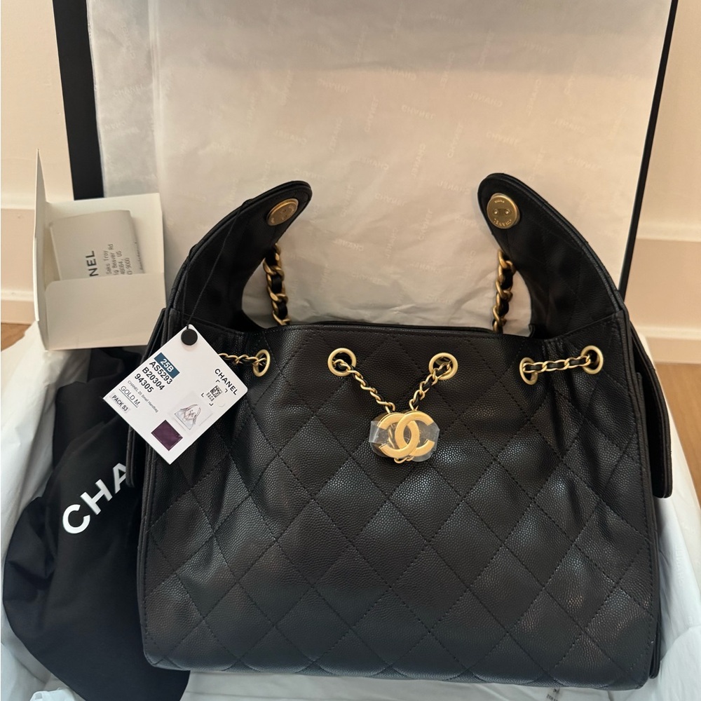 CHANEL Black Quilted Hobo with Gold Accents